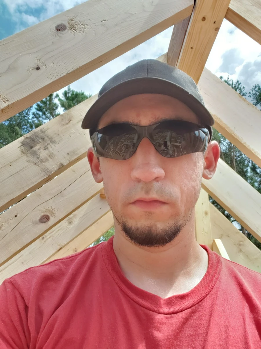 Taylor working on a residential framing project